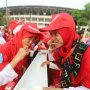 Senyum Ceria Siswa Saat Belajar Menyikat Gigi