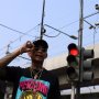 Sambil Bawa CIU, Young Lex Ngamen di Lampu Merah