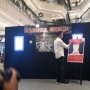 Pameran Foto, Jokowi Terkesan dengan Potret Dirinya Gendong Anak Papua