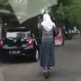 Berboncengan Tanpa Helm Naik Grabwheels di Jalan Raya, Video ABG Ini Viral