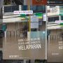Viral Pedagang Gorengan Tetap Jualan saat Banjir Jakarta 2020