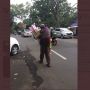 Berjualan Sambil Gendong Anaknya, Penjual Sapu Lidi Ini Viral