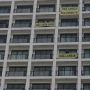 Penghuni Nine Residence Pasang Spanduk Penolakan RS Darurat Corona