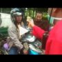 Pemotor Girang Disemprot Disinfektan Gratis, Publik Heran dengan Suhunya