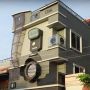 Saking Cintanya pada Kamera, Pria Ini Bangun Rumah Berbentuk Tustel