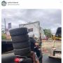 Bikin Pusing Lihatnya, Viral Pemotor Angkut 4 Ban Mobil dengan Cara Ekstrem