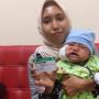 Anak Sembuh dari Tumor, Ini Kisah Pasangan Penerima JKN - KIS