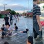 Viral Warga Asyik Rebahan di Tengah Banjir, Warganet Salah Fokus ke Airnya