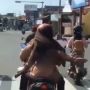 Viral Aksi Cewek Pakai Seragam Sekolah Merokok sambil Naik Sepeda Motor