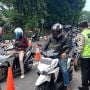 PPKM Diperpanjang, Polisi Klaim Jumlah Kendaraan Masuk ke Jakarta Kini Sedikit