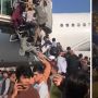 Ricuh! Ribuan Warga Afghanistan Panik Berebut Naik Pesawat di Bandara Kabul