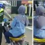 Tak Terima Ditilang, Emak-Emak Nekat Berada di Atas Motor Sambil Didorong Aparat