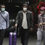 Foto-foto Bupati Kuansing Tiba di Gedung KPK hingga Pakai Rompi Oranye