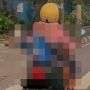 Viral Posisi Bocah Bonceng Ibu Naik Motor Bikin Ngilu: Kondisi Lehernya Disorot