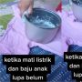 Emak-emak Setrika Pakai Panci Penanak Nasi, Jadi Solusi saat Mati Listrik