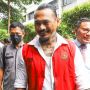 Adam Deni Ditangkap, Jerinx SID Jalani Sidang dengan Senyum Sumringah