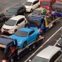 Video Iring-iringan Truk Towing Bawa Mobil dan Moge Doni Salmanan Viral, Warganet: Sultan Soreang Sudah Tumbang