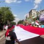 Tolak Khilafah Sampai Kiamat, Warga Jogja Bentangkan Bendera Merah Putih Sepanjang 90 Meter di Tugu Pal