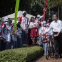 Presiden Jokowi Bawa Sepeda saat Hadiri Peringatan Hari Anak Nasional