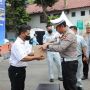 Gandeng BNI dan Jasaraharja Putera, Korlantas Bagikan Ratusan Sembako ke Supir Bus