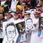 Bawa Poster Mesut Ozil sambil Tutup Mulut, Suporter Qatar Sindir Balik Timnas Jerman
