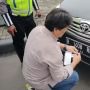 Sopir Mobil Pelat Merah Tertangkap di Cawang, Nekat Pakai Nopol RFN Palsu Gegara Takut Kena Tilang Gage