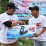KST Beri Bantuan Lampu Penerangan ke Pul Truk di Pandeglang Banten