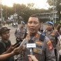 Demo Kondusif, Kapolres Jakpus Tak Masalah Massa Buruh Gunakan Flare dan Smoke Bomb
