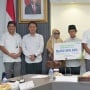 Menag Yaqut Serahkan Santunan BPJS Ketenagakerjaan 183 Juta Kepada Keluarga Petugas Haji yang Meninggal Saat Tugas