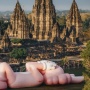 Fakta Menarik KAWS:HOLIDAY, Patung Raksasa Karya Brian Donelly Rebahan di Candi Prambanan