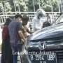 Mobil Honda CRV Terguling di Jalan Pramuka Jaktim, Diduga Gegara Main HP