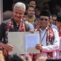 Pakai Kemeja Warna Berbeda dengan Ganjar Pranowo, Mahfud MD: Ada Pesan Tuhan di Baju Ini