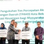 Dukung Inklusi Keuangan, Pegadaian Ajak Masyarakat Bantar Gebang Memilah Sampah Menabung Emas