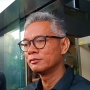 Senyum Wahyu Setiawan saat Diperiksa KPK Terkait Kasus Suap Harun Masiku dan Hasto