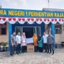 PalmCo Distribusikan Puluhan Komputer ke Sekolah Remote Area di Riau