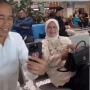 Jenguk Cucu Naik Pesawat Komersil, Iriana Jokowi Tenteng Tas Chanel Harganya Selangit