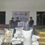 BULOG - Satgas Pengamanan Swasembada Pangan  Garuda Merah Putih Salurkan Bantuan Program Makanan Bergizi di Merauke