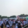 Ramaikan Kampanye Akbar RK-Suswono di Kalideres karena Ada Dewa 19, Pendukung RIDO Dapat Kaus Putih