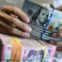 Rupiah Loyo ke Rp17.035, Defisit Anggaran hingga Isu Perang AS-Iran Jadi Biang Keladi