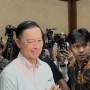 7 Tahun Penjara Menanti? Pendukung Nyanyikan Indonesia Raya saat Tom Lembong Masuk Ruang Sidang