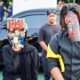 Aksi Tolak RKUHAP di Gerbang Pancasila DPR