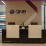 Kantor Cabang Bank QNB Berguguran, OJK Ungkap Kondisi Karyawan yang Kena PHK