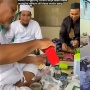 Viral Aksi Nyeleneh Pria Pakai Baju Muslim Minum Oli Mesin di Makassar, MUI Sulsel: Itu Haram!