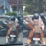 Bikin Melongo, Emak-Emak Ini Angkut Motor Listrik Sambil Dibonceng