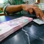 Rupiah Dibuka Menguat Tipis ke Level Rp17.652 per Dolar AS