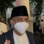 Pakai Masker dan Berjalan Cepat, Raja Juli Cuma Ucap 'Terima Kasih' Saat Ditanya Soal KPK