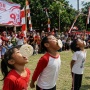 8 Aturan Lomba Makan Kerupuk 17 Agustus yang Aman dan Seru untuk Anak-anak