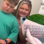 Demi Putranya yang Autisme, Ibu ini Membuat Tato Keyboard di Tangannya