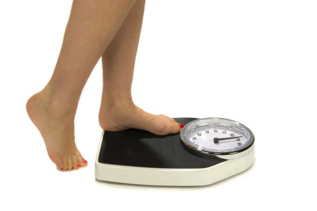 Ilustrasi berat badan. (sumber: Shutterstock)