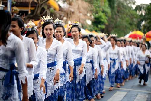 GIANYAR, BALI, INDONESIA- MAY 21: Unidentified villagers bring gifts to the gods at the Balinese Temple during the Odalan Festival on May 21, 2011 in Gianyar, Bali, Indonesia.